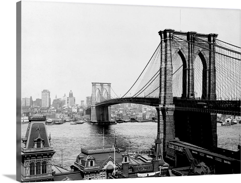 The Brooklyn Bridge, the largest suspension bridge and the first to ever be built with steel, spans the East River Between...