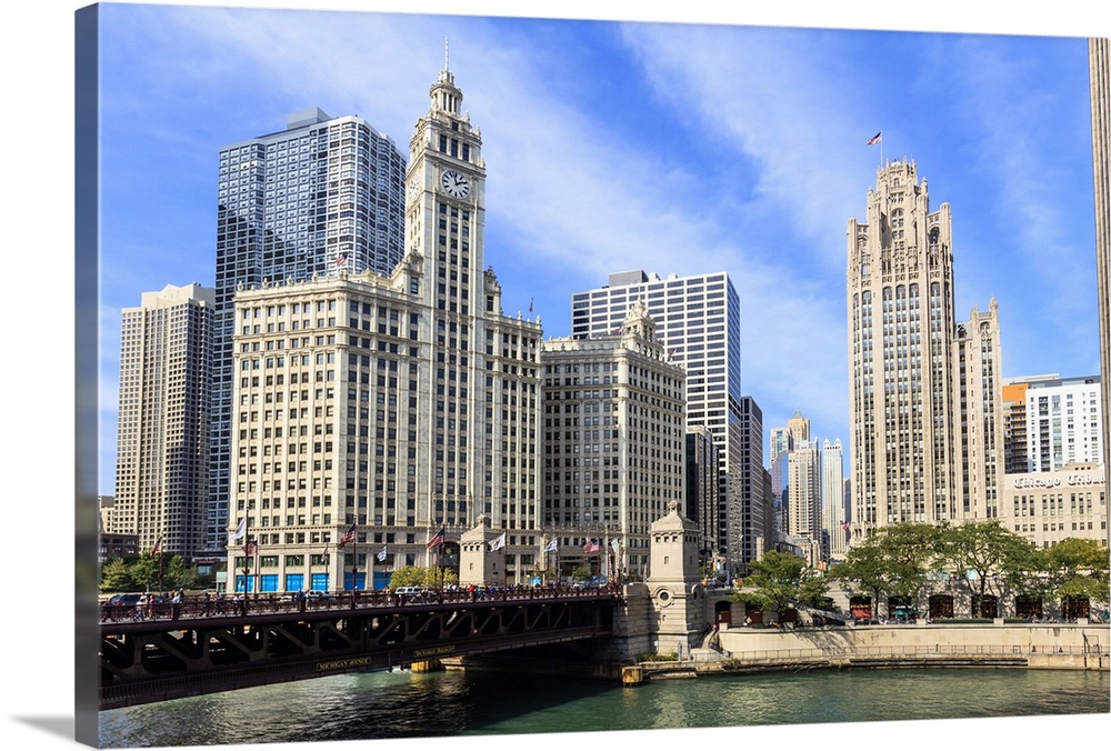 The Wrigley Building and Tribune Tower stand north of the DuSable Bridge on the Chicago River, Chicago, Illinois.