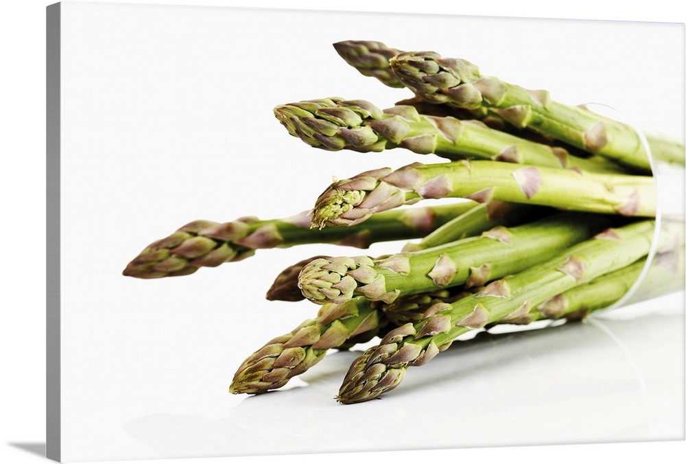 Bunch of asparagus in beaker, close-up