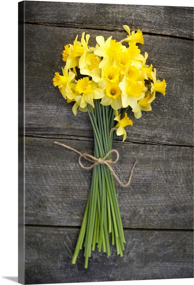 Bunch of daffodils on a wooden table