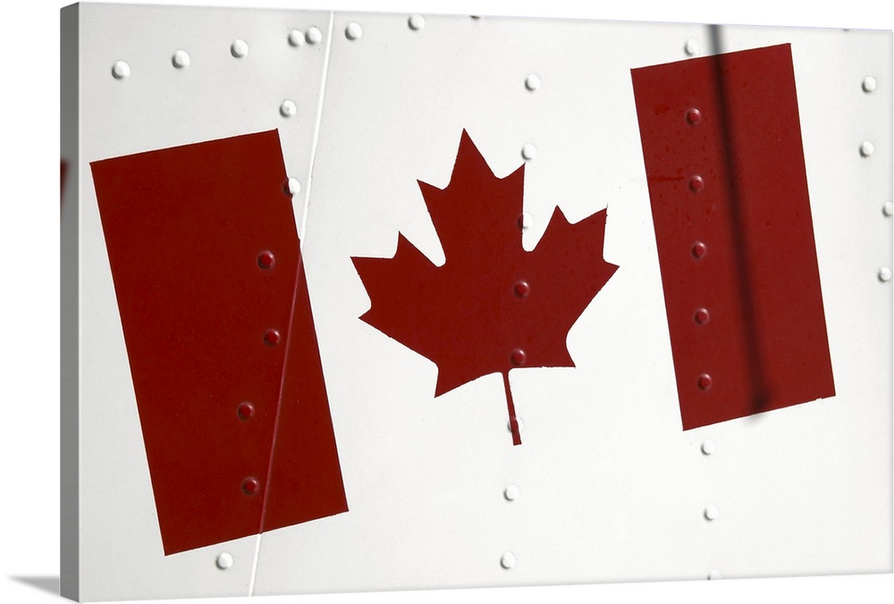 Canadian flag painted on the exterior of an airplane