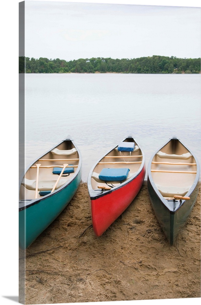 Canoes at lake shore