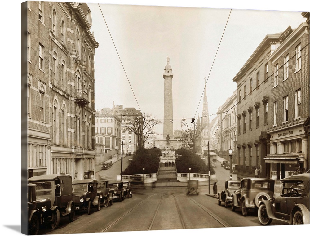 View of Charles St., looking north from Baltimore St. The Washington Monument is shown in the foreground. Undated.