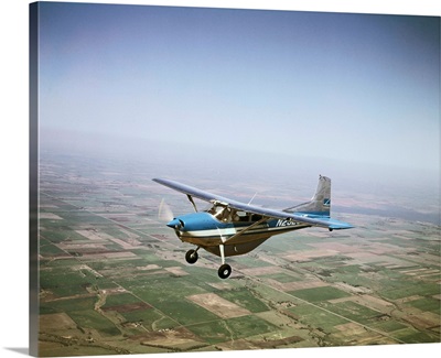 Cessna 150 Flying in Sky