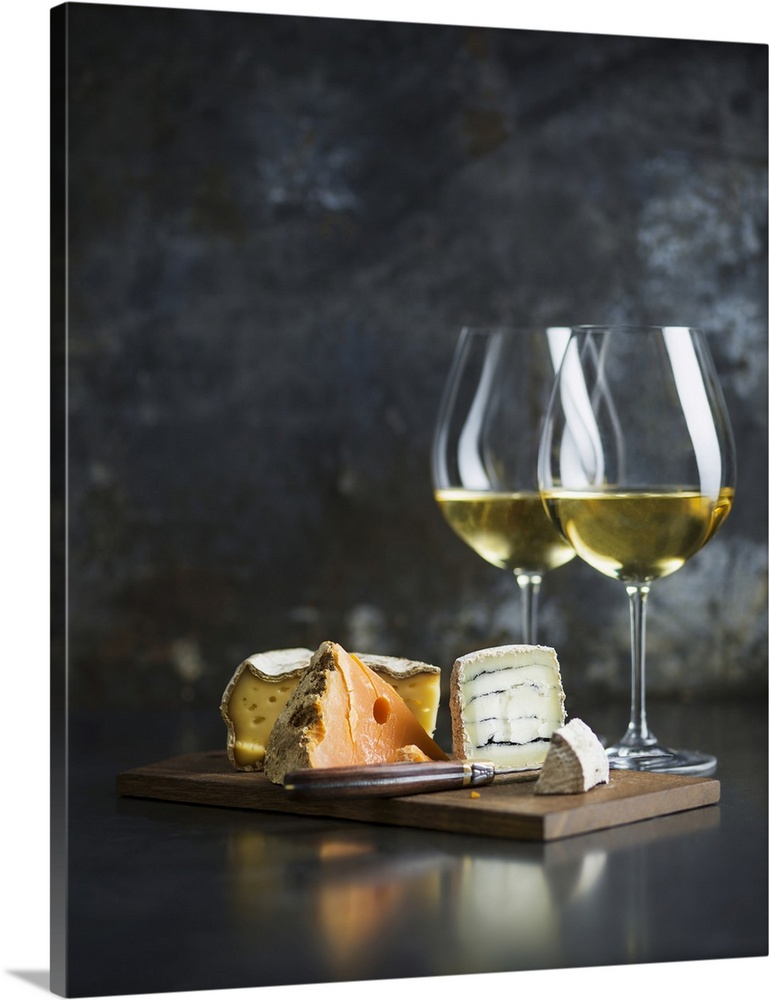 Cheese platter and white wine.