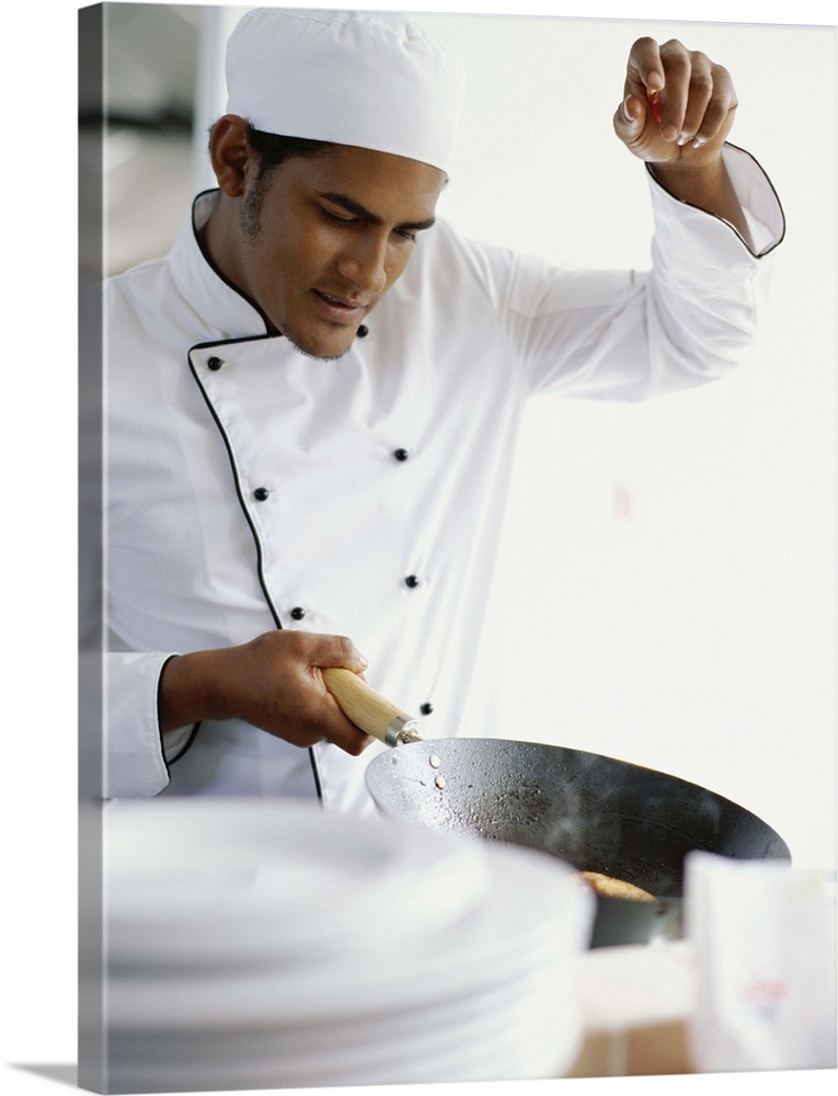 Chef cooking food in the kitchen