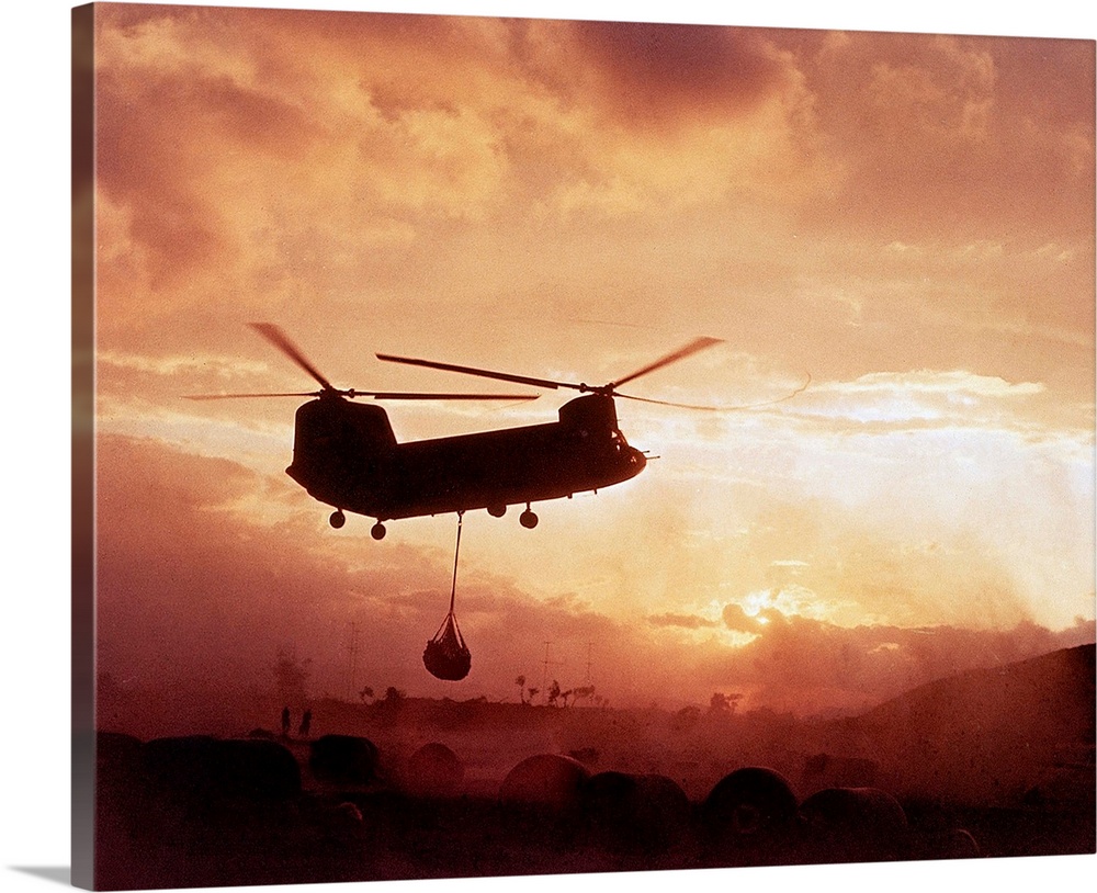 11/3/1966-An Khe, South Vietnam: A CH-47A Chinook helicopter from the Army's 228 Aviation Battalion lifts a load of ammuni...