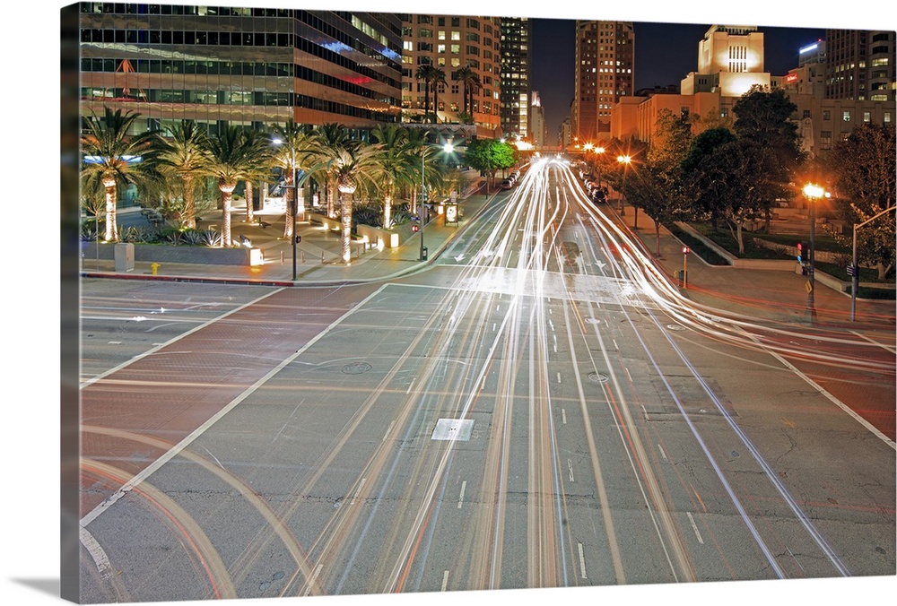 City light trails on street in Downtown with building, Crossroad at Los Angeles, California, United States.