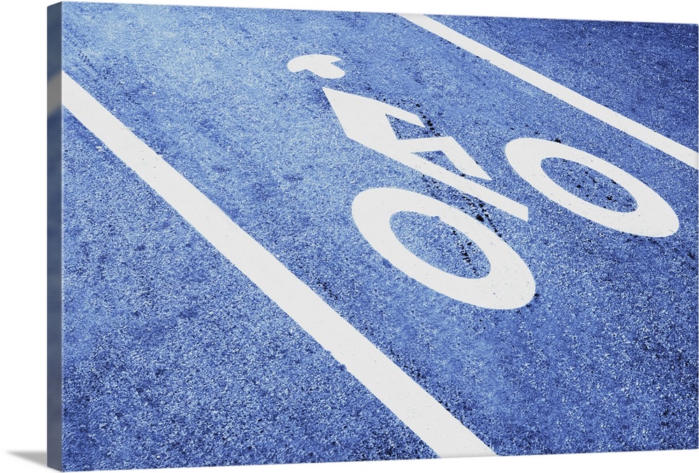 Close-up of a bicycle sign on the road