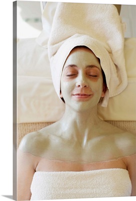 Close-up of a mid adult woman having a facial