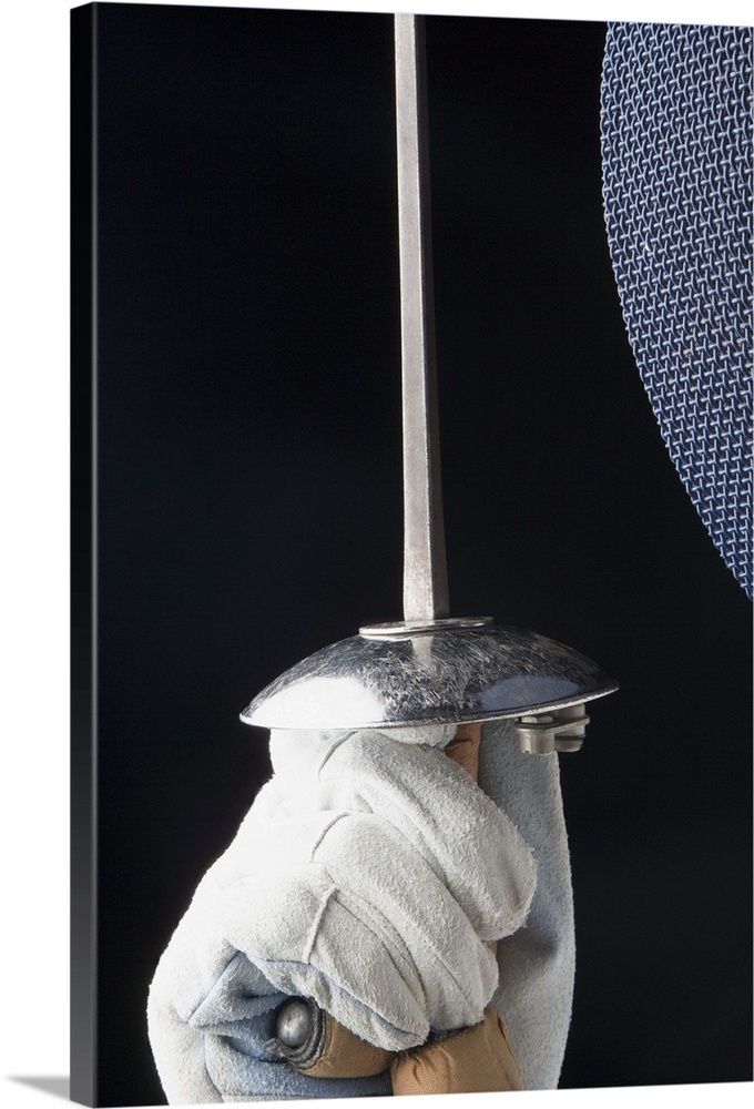 Close-up of a person's hand holding a fencing foil