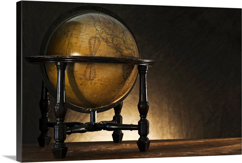 Close up of antique globe on table