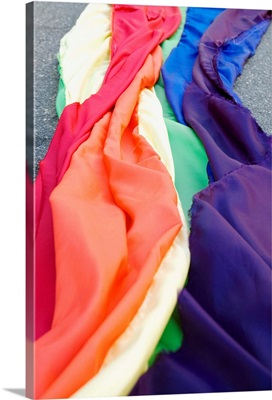 Close-up of gay rights rainbow-colored flag draped across road