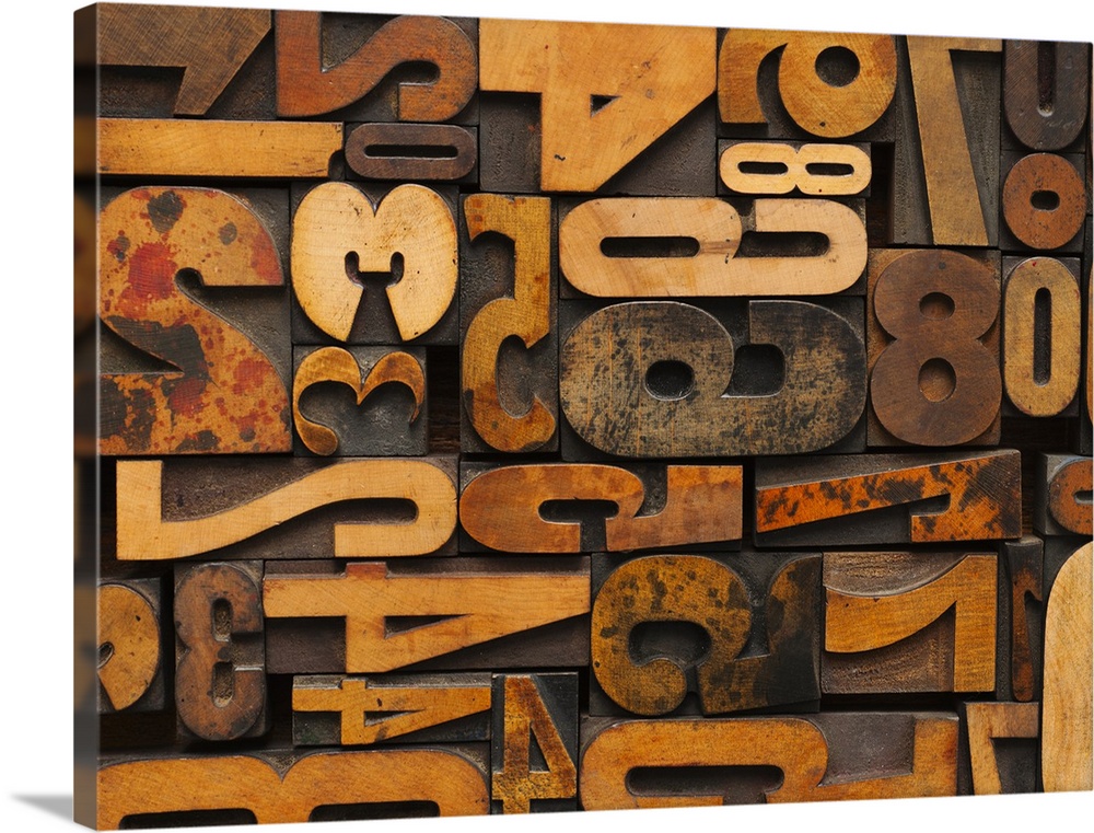 Horizontal decorative wall art of wood block numbers arranged to fill the space.