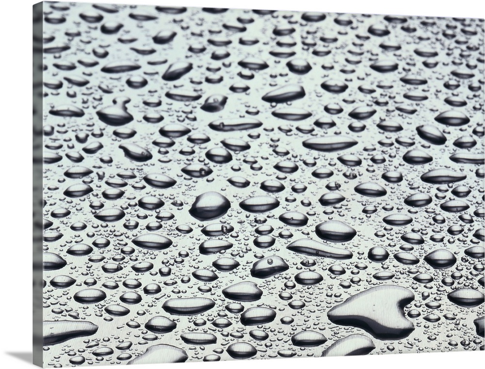 close-up of water drop on a gray surface