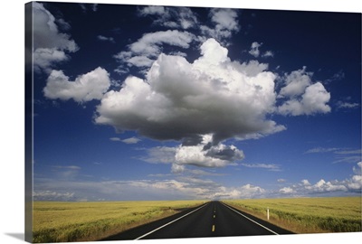 Clouds floating over rural highway