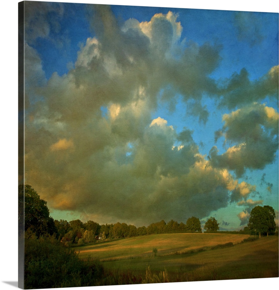 Late summer cloud drama over hillside fields.