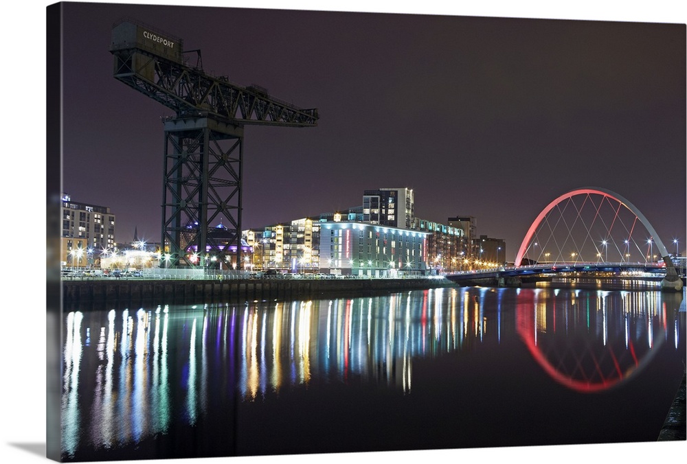 View of Finnieston Crane and Clyde arc bridge on the River Clyde at night