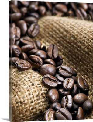 Coffee beans on burlap sack