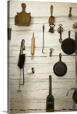 Collection of old-fashioned kitchen utensils and implements