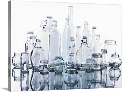 Collection of various glass bottles and jars