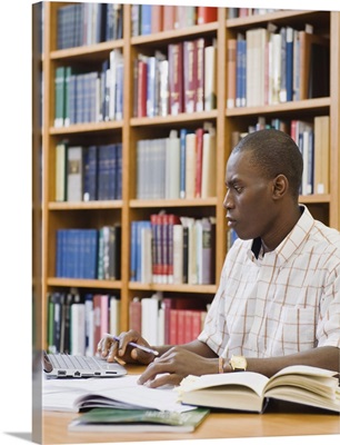 College student working in library