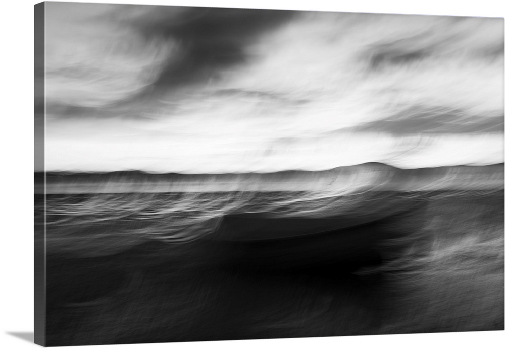 Monochrome intentional camera movement blurs of coastal impressionist style image in morning light. New Zealand.