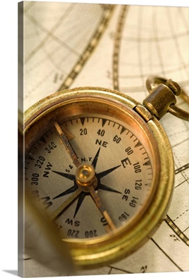 Compass on antique map