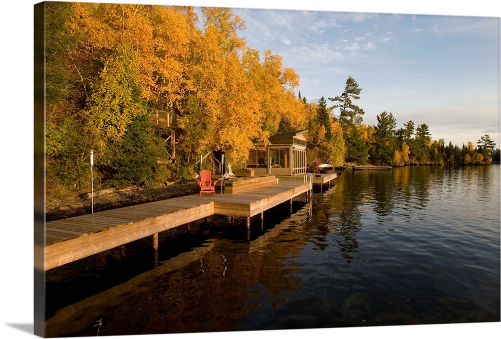 Cottage dock and autumn foliage, Lake of the Woods, Ontario, Canada