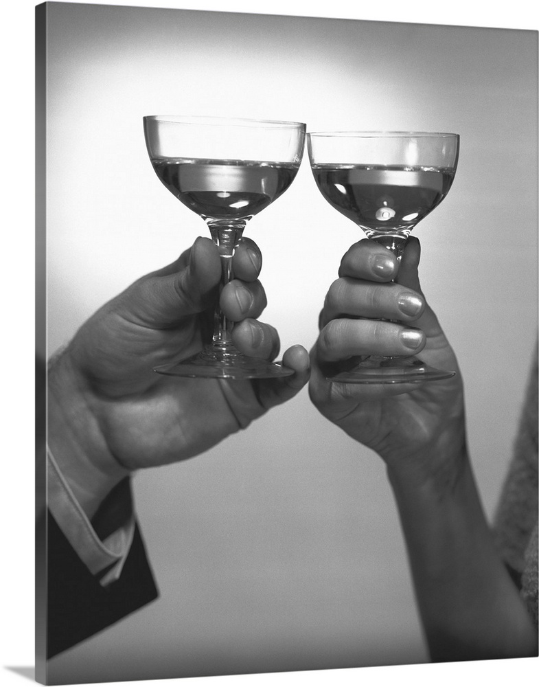 Couple toasying with white wine, (Close-up of hands), (B&W)