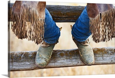 Cowboy Boots On Fence