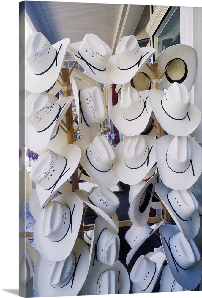 Cowboy hats hanging in a hat shop, Texas, USA