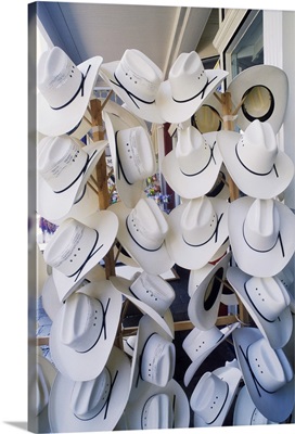 Cowboy hats hanging in a hat shop, Texas, USA