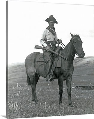 Cowboy on Horseback with Rifle