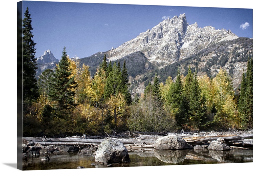 Fall foliage, boulders and creek at south end of Jenny Lake, Grand Teton National Park.