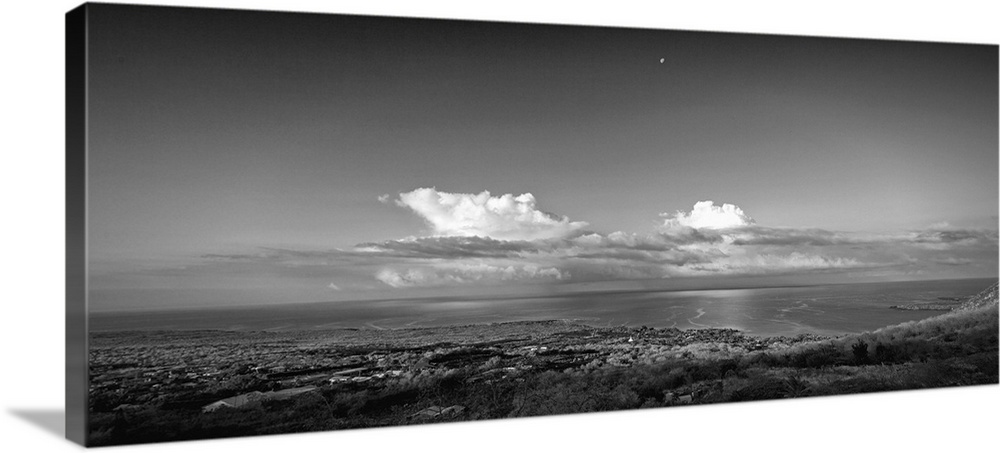 Cumulus clouds with moon over Kealakekua Bay