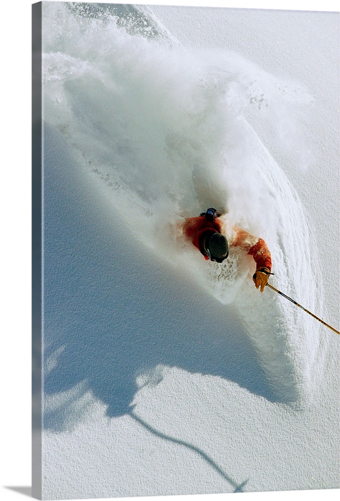 ca. 2001, Utah, USA --- Dave Richards Skiing in Deep Powder Snow --- Image by .. Lee Cohen/CORBIS