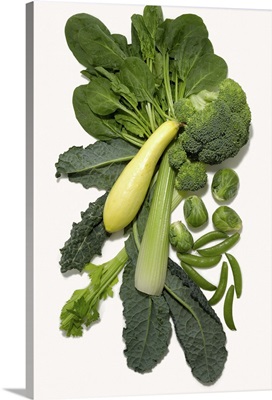 Different green vegetables on white background