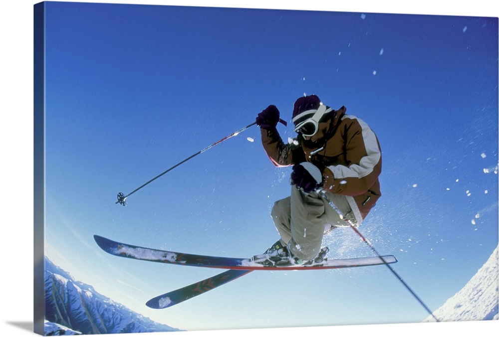 Downhill skier in mid-air