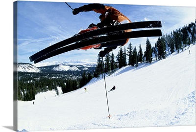 Downhill skier, mid-air