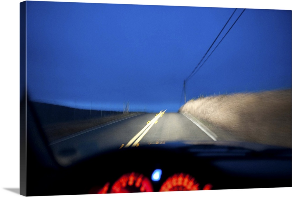 Driving at night on a country road.