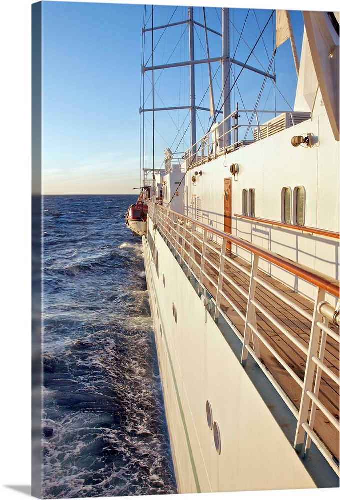 Early morning view of small ship cruising, the Wind Spirit of Windstar Cruises, on the Mediterranean Sea