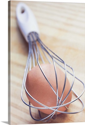 Egg inside egg whisk.