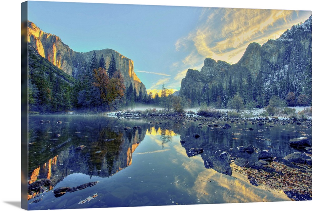 A morning reflection of El Capitan and Three Brothers on the Merceed River at Yosemite National Park, California.<a href='...