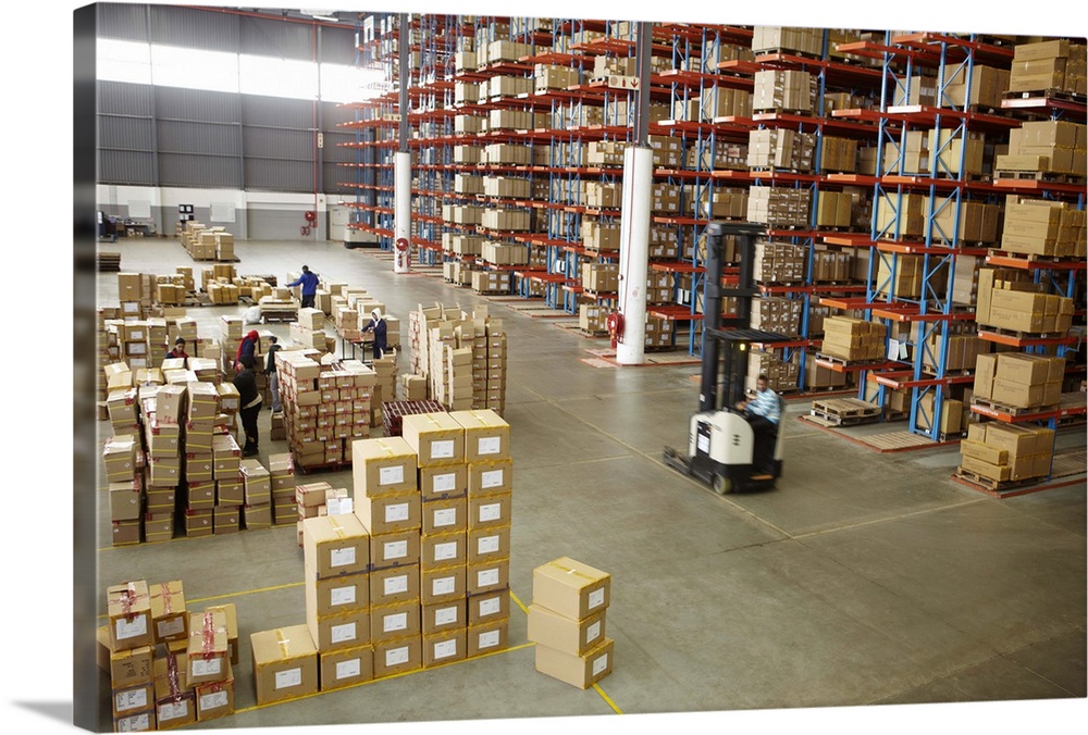 Elevated view of large distribution warehouse storing boxes of clothing