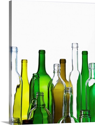 Empty glass bottles on white background