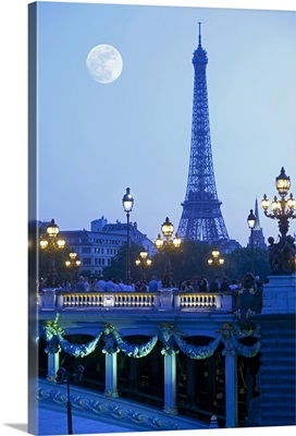 Evening view of Eiffel Tower at moonrise