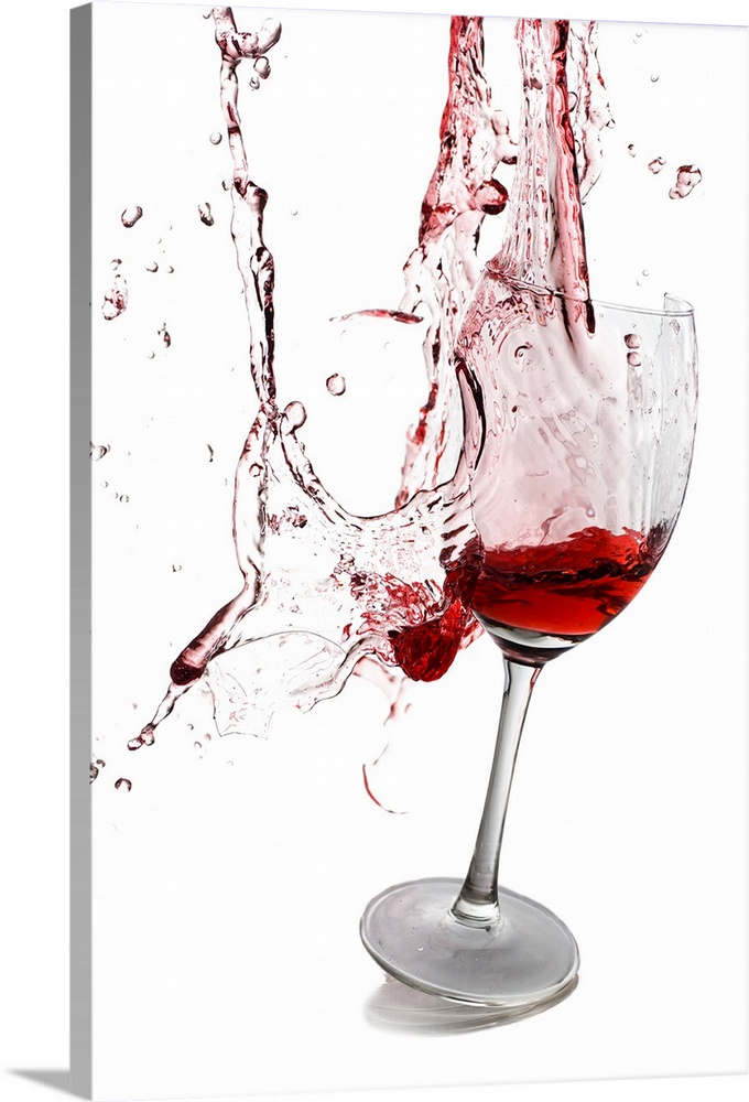 Portrait photograph on a large wall hanging of a slightly tilted glass of red wine, the goblet appears to be exploding and...