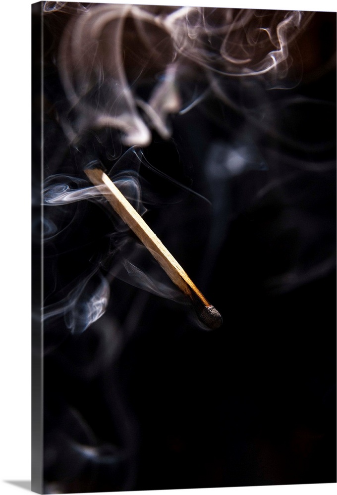 Extinguished Smoking Match on Black Background