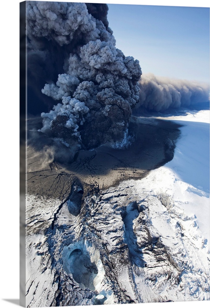 Massive ash plume erupting through 200 meter thick glacial ice sheet at the summit of Eyjafjallajokull volcano.